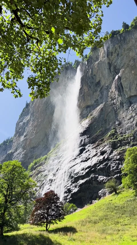 Breathtaking Serene Waterfall View Surrounded by Beautiful Natural Elements and Stock Footage 304782198