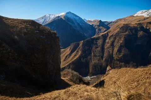 The breathtaking sight of brown mountains capturing the essence of tranquility Stock Photos