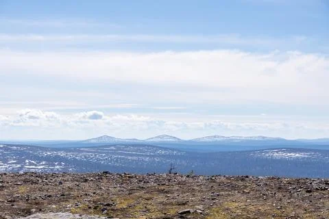 Breathtaking springtime landscape view over the vast wilderness and rolling h Stock Photos