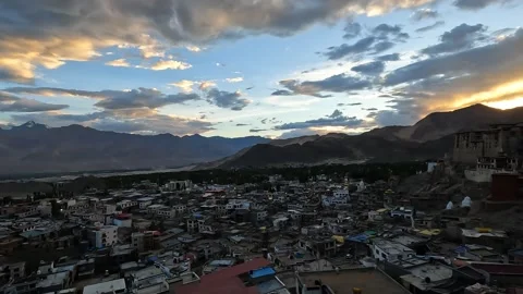 Breathtaking sunset from a mountain summit overlooking Leh Stock Footage 319952849