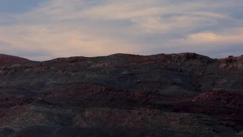 A breathtaking sunset over Moab's iconic red rocks, captured in a mesmerizing Stock Footage 307165319