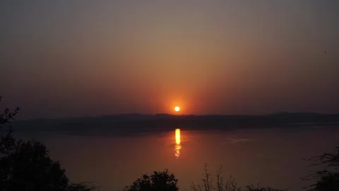 Breathtaking Sunset over River and Mountains - Timelaps Stock Footage 285137708
