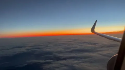 Breathtaking Sunset View from Airplane Window Stock Footage 277950370