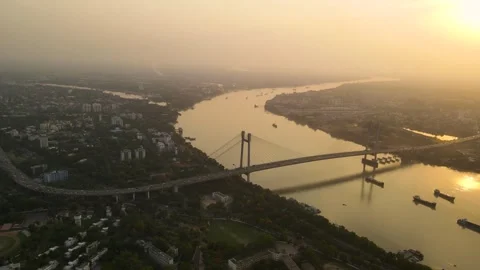 Breathtaking sunset view of Vidyasagar Bridge in Kolkata, showcasing its Stock Footage 299217641