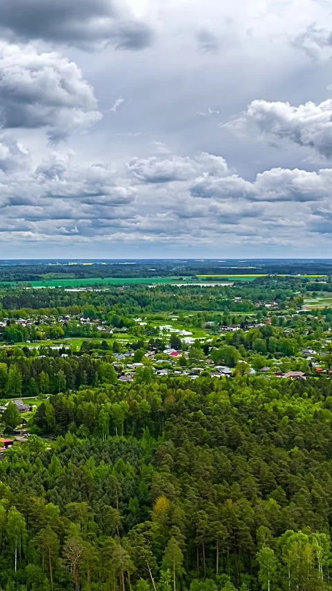 Breathtaking Timelapse of Expansive Green Landscape Under Cloudy Sky Stock Footage 334092674