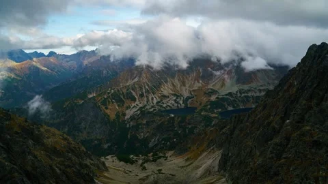 Breathtaking Timelapse of Tatra Mountains with Lake and Cloudy Sky Stock Footage 280441968