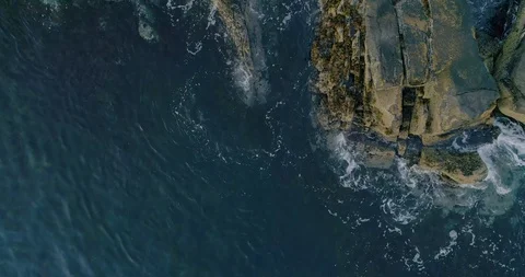 Breathtaking top aerial slow motion view of azure ocean and waves crashing at Stock-Footage 128002476