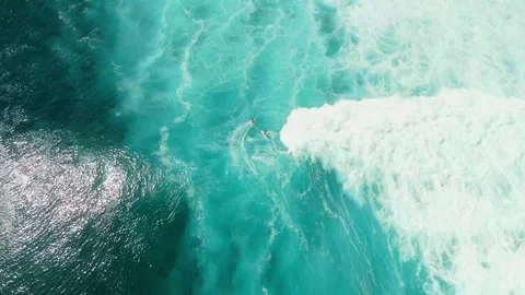 Breathtaking Top Down Shot Surfer Paddling Lineup Uluwatu 4K Stock Footage 341409688