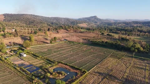 Breathtaking Valley Landscape with Green Fields and Distant Mountains Stock Footage 326176286