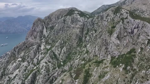 A breathtaking view above Kotor showcasing the rugged mountains and serene Video stock 287756117