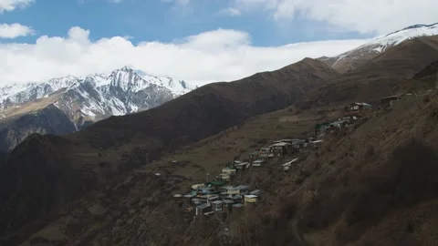 Breathtaking view of authentic village surrounded by majestic mountains Stock Footage 200857147