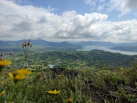 Breathtaking view of a beautiful, rolling valley and surrounding hills. Stock Photos