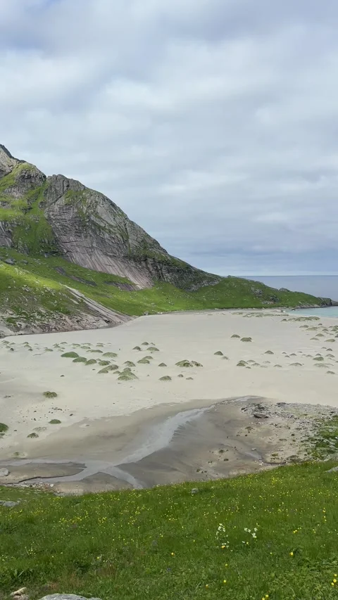 Breathtaking view of Bunes Beach from the Einangen pass overlooking the white  Stock Footage 334787662