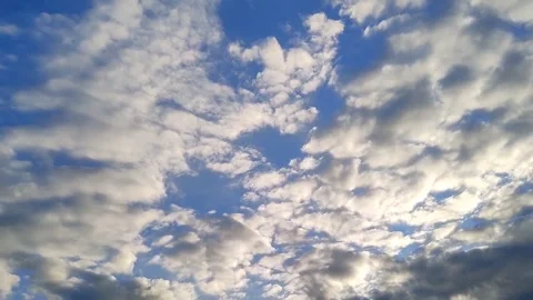 Breathtaking view of clear blue sky with clouds, creating serene and peaceful Stockbeeldmateriaal 317920566
