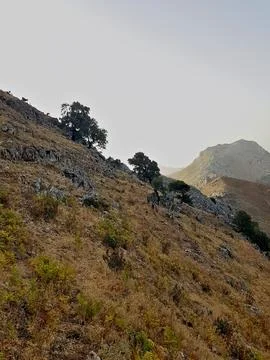 A Breathtaking View Of The High Mountain Range, Its Towering Peaks Rising Stock Photos