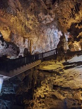 A breathtaking view inside an underground cave, showcasing stunning stalact.. Stock Photos