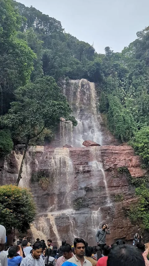 Breathtaking view of jhari waterfall descending gracefully through verdant .. Stock-Footage 346817501