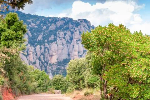 Breathtaking view to Montserrat mountain range on a sunny summer day, Catalon Stock Photos
