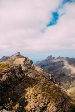 Breathtaking view of a mountain landscape under a cloudy sky Stock Photos