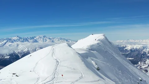 Breathtaking view on the mountains covered in snow with blue sunny sky above Stock Footage 106066247