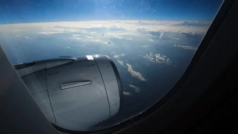 Breathtaking view from plane's illuminator during morning flight. Stock Footage 274889818