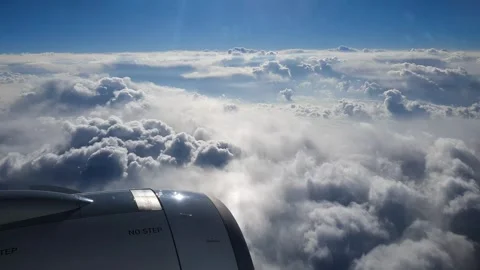 Breathtaking view from plane's illuminator during morning flight. Stock Footage 274889820