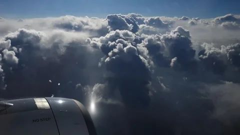 Breathtaking view from plane's illuminator during morning flight. Stock Footage 274889883