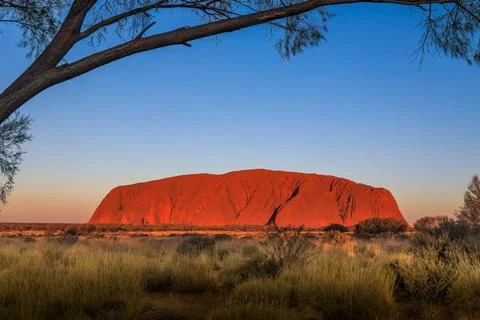 A breathtaking view of Uluru at sunset Foto stock