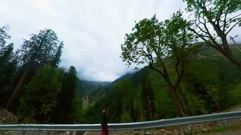 A Breathtaking View of the Valley from a Mountain Road Video stock 234526717
