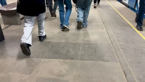 The breathtaking view of various unrecognizable people strolling through a busy Stock Footage 316460436