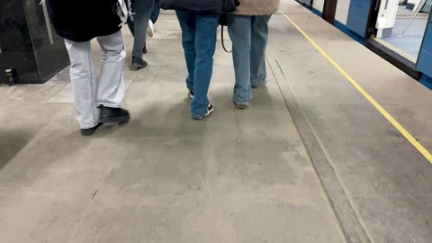 The breathtaking view of various unrecognizable people strolling through a busy Stock Footage 316460504