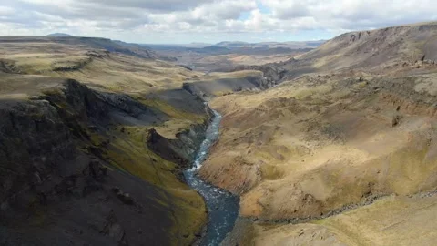 Breathtaking views of a winding river in a vast canyon landscape Video stock 320319812