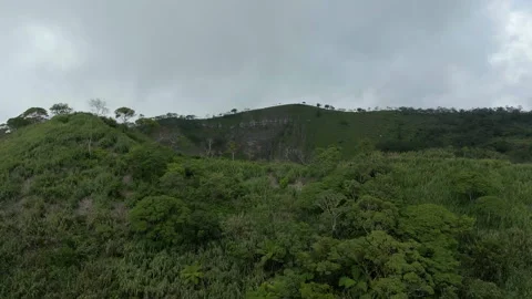 Breathtaking Volcanic Lake with Clouds Mount Mahawu Aerial Shot 库存影片 339856476
