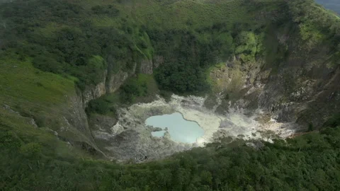 Breathtaking Volcanic Lake with Clouds Mount Mahawu Aerial Shot 库存影片 339857851