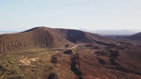 Breathtaking volcanic landscape under clear blue sky Stock Footage 307643305