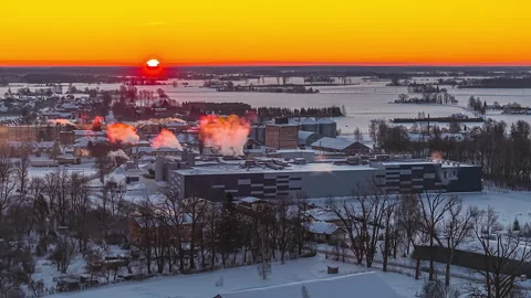 Breathtaking Winter Sunset Timelapse Over Snow-Covered Town Horizon Glow Stock Footage 331198593