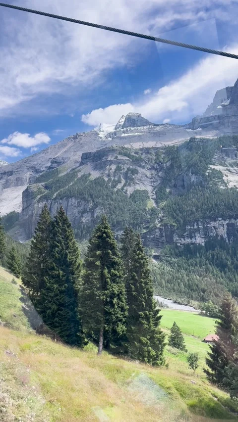 Breathtakingly Stunning Mountain Landscape Capturing a Cable Car Gliding in the Stock Footage 307487078