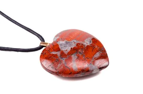 Breciated jasper heart with leather string Stockfoto's