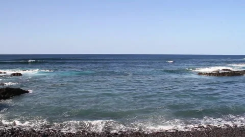 Breeze and turquoise ocean waves on a sunny day Stock Footage 157277766