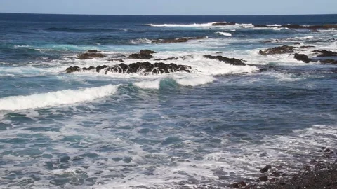 Breeze and turquoise ocean waves on a sunny day Stock Footage 157277794