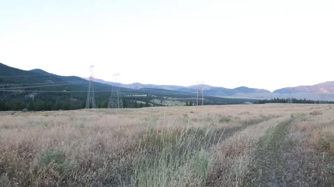 Breezy countryside powerlines Stock Footage 45863792