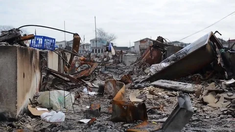 The Breezy Point area of Queens New York is devastated by Hurricane Sandy. Vídeos de archivo 74811487