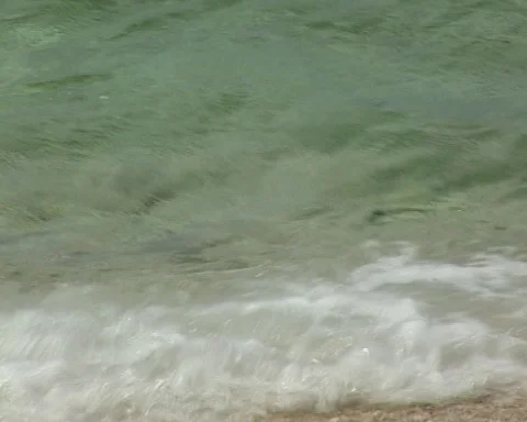 Brela, Croatia. Emerald crystal clear translucent waves of the Adriatic Sea Stock Footage 106552943