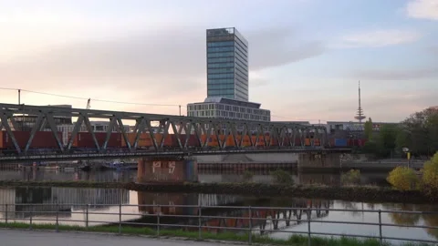 Bremen, Germany -HAPAG-LLOYD containers on freight train over Weser. 4k. Stock Footage 194543841