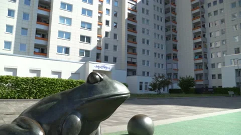 Bremen Tenever - statue of a frog in front of a social housing building,4k Video stock 195985410