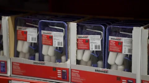 Brenner 100mm Mini Paint Roller Kits Packaged in Blue Trays on Hardware Store Video stock 332662994
