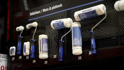 Brenner Paint Roller Range Displayed by Size on Black Perforated Panel Interior Stock Footage 332656338