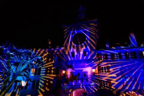 Brentor or Bern Gate with clock illuminated on the light festival in Murten Stock Photos
