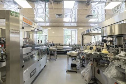 Brest Distillery. A machine for applying labels to bottles. Stock Photos