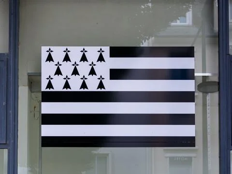 The breton flag displayed in a window Stock Photos